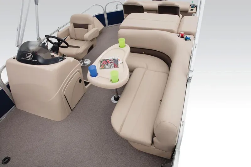 Slide: The Image of 2017 Sun Tracker Fishin' Barge 22 XP3 interior with beige seating and striped fabric. - 8