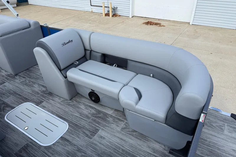 Slide: The Image of 2026 Bentley Pontoons Legacy 223 Cruise XL with luxurious gray seating and modern design. - 10