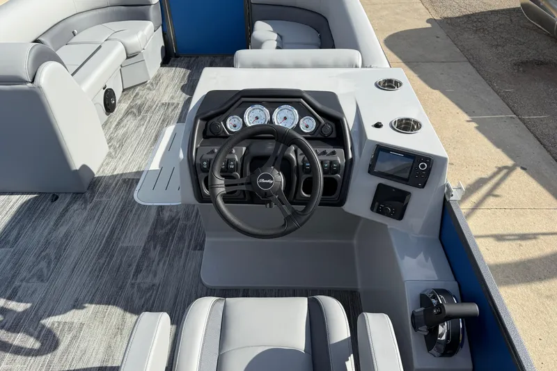 Slide: The Image of 2026 Bentley Pontoons Legacy 223 Cruise XL dashboard with modern controls and seating. - 18