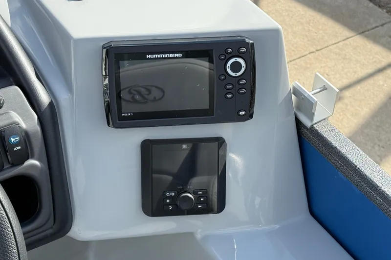 Slide: The Image of Control panel of 2026 Bentley Pontoons Legacy 223 Cruise XL with Humminbird and JBL systems. - 21