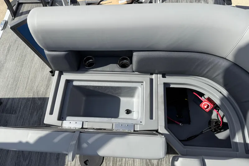 Slide: The Image of 2026 Bentley Pontoons Legacy 223 Cruise XL interior with storage compartments and cup holders. - 25