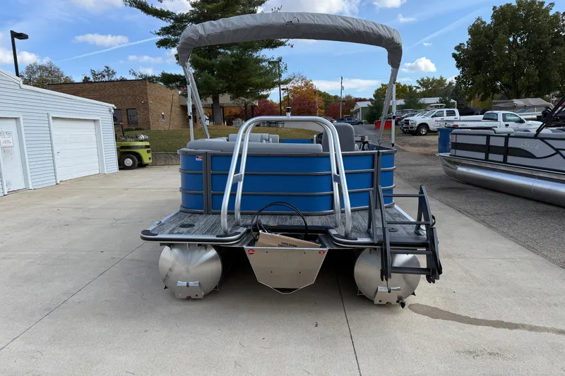 Slide: The Image of 2026 Bentley Pontoons Legacy 223 Cruise XL pontoon boat, rear view in a parking area. - 6