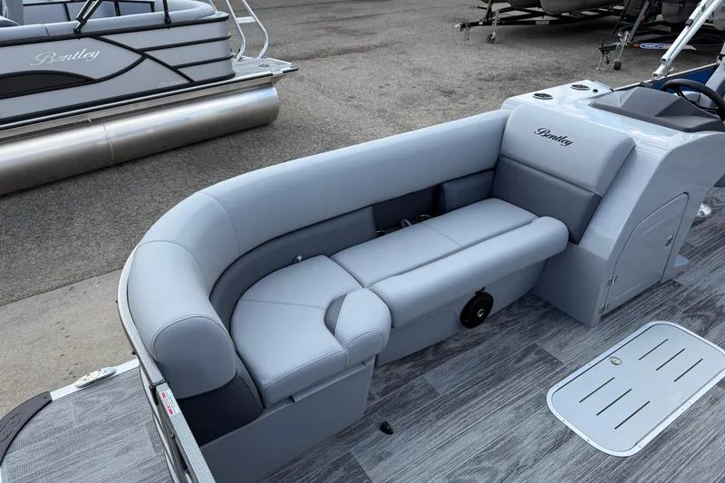 Slide: The Image of 2026 Bentley Pontoons Legacy 223 Cruise XL with luxurious seating and sleek design. - 9
