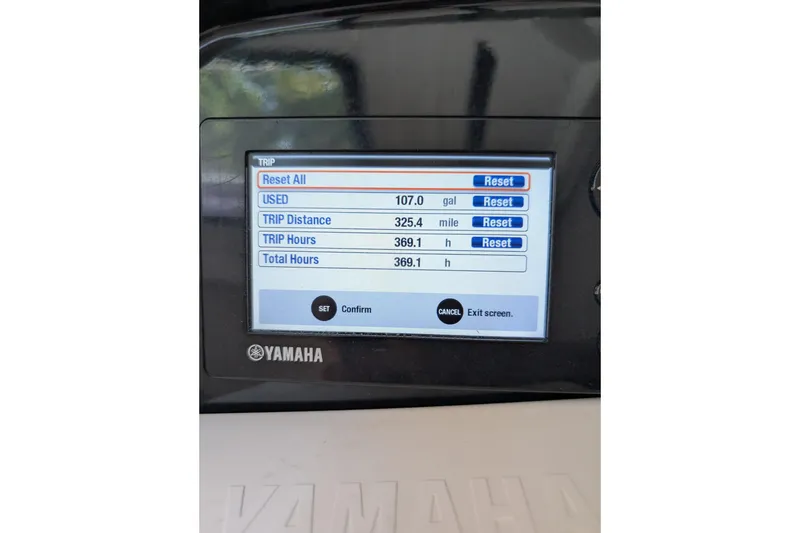 Slide: The Image of Yamaha display showing trip data: 107 gallons used, 325.4 miles, 369.1 hours. Jeanneau Merry Fisher 795. - 9