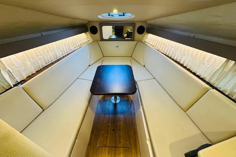 Slide: The Image of Luxurious interior of 2017 Regal 28 Express boat with elegant seating and table. - 24