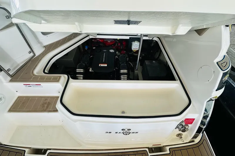 Slide: The Image of 2017 Regal 28 Express boat engine compartment with open hatch. - 34