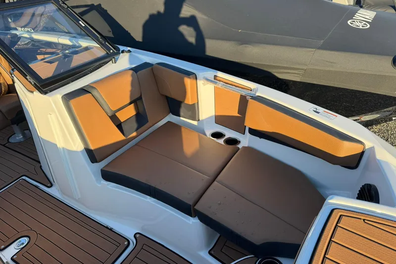 Slide: The Image of 2026 Yamaha Boats 222SD interior with tan leather seating and modern design. - 7