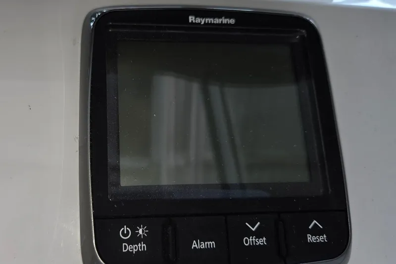 Slide: The Image of Raymarine display panel on 1998 Mainship Pilot 30 boat dashboard. - 30