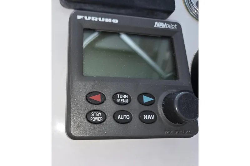 Slide: The Image of Furuno NAVpilot control panel on 1998 Mainship Pilot 30 boat. - 31