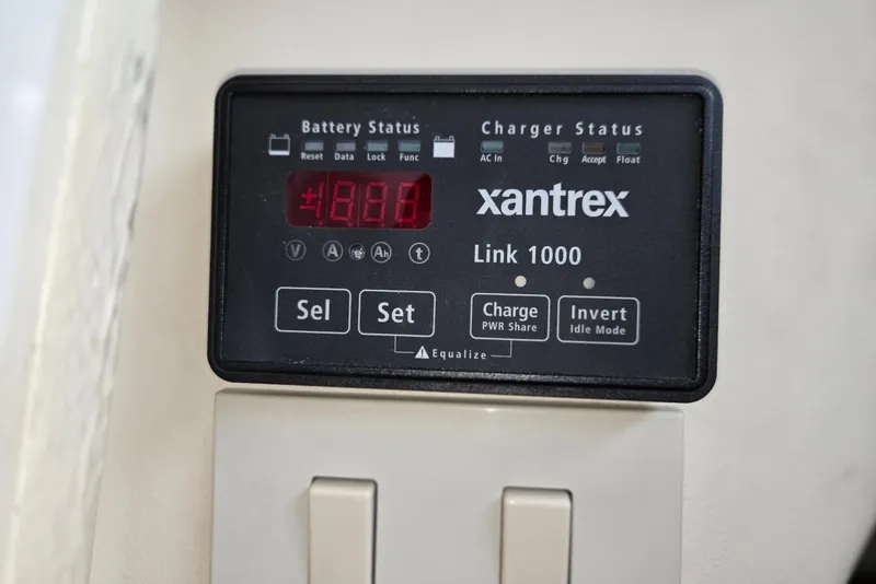 Slide: The Image of Xantrex Link 1000 battery charger display on 1998 Mainship Pilot 30 boat. - 33