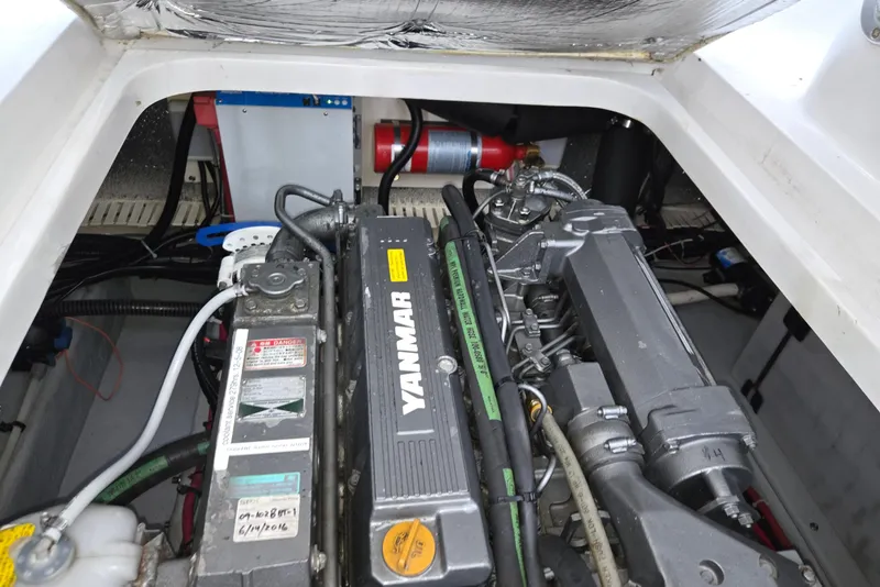 Slide: The Image of Engine compartment of a 1998 Mainship Pilot 30 with Yanmar diesel engine. - 39