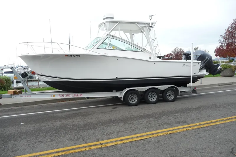 The Image of 2016 Albemarle 25 Express boat on trailer, parked near marina. - 0