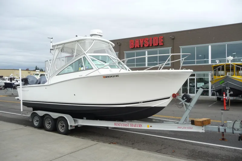 Slide: The Image of 2016 Albemarle 25 Express boat on trailer outside Bayside dealership. - 6