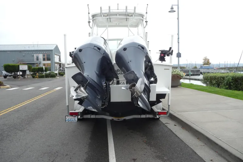 Slide: The Image of 2016 Albemarle 25 Express boat with dual outboard motors at Port of Everett. - 7