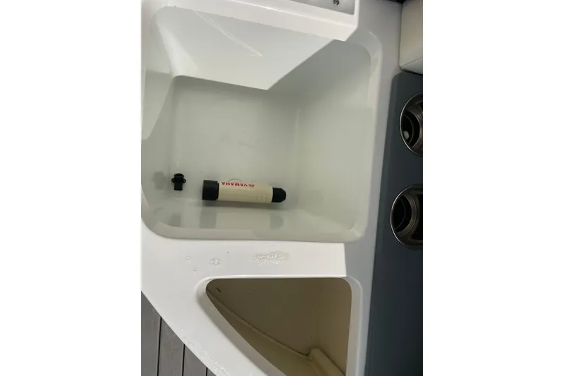 Slide: The Image of 2018 Cobalt 25SC boat sink with a Yamaha filter inside. - 24