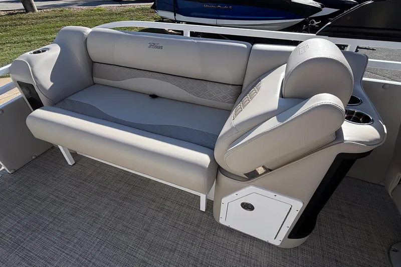 Slide: The Image of Luxurious seating on 2026 JC Neptoon 25TT Sport pontoon boat, featuring plush upholstery. - 10