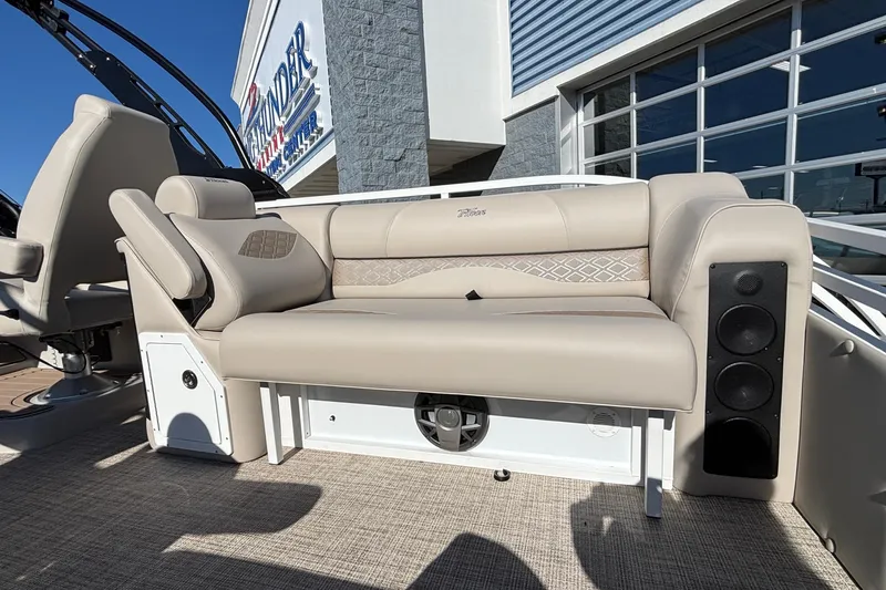 Slide: The Image of Luxurious seating on 2026 JC Neptoon 25TT Sport boat, featuring premium upholstery and integrated speakers. - 12