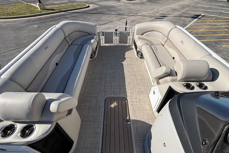 Slide: The Image of 2026 JC Neptoon 25TT Sport pontoon boat interior with luxurious seating and modern design. - 16