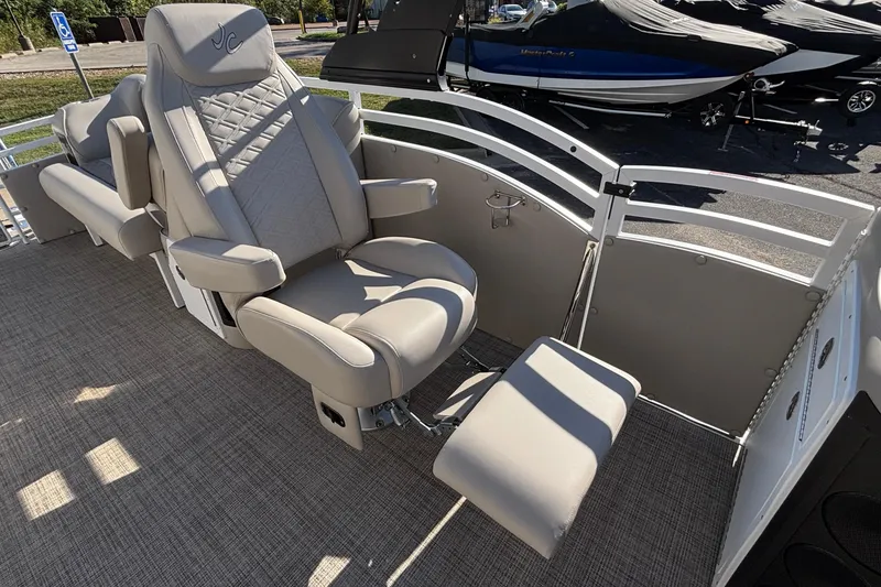 Slide: The Image of Luxurious seating on 2026 JC Neptoon 25TT Sport pontoon boat, featuring plush upholstery. - 27