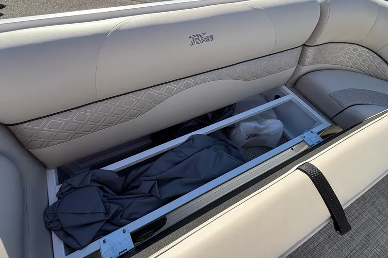 Slide: The Image of 2026 JC Neptoon 25TT Sport boat interior with storage compartment and luxurious seating. - 30