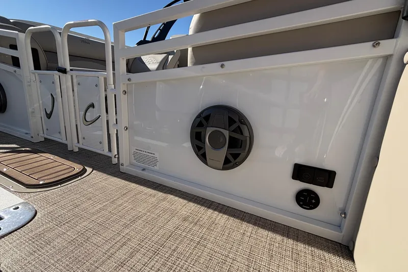 Slide: The Image of 2026 JC Neptoon 25TT Sport boat interior with speaker and control panel. - 6