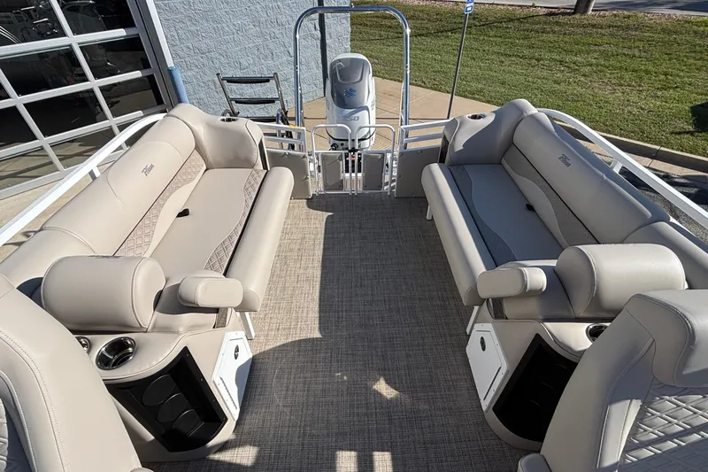 Slide: The Image of Luxurious interior of 2026 JC Neptoon 25TT Sport pontoon boat with plush seating. - 9