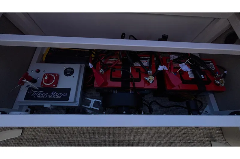 Slide: The Image of Battery control center of 2026 JC Neptoon 25TT Sport boat. - 23