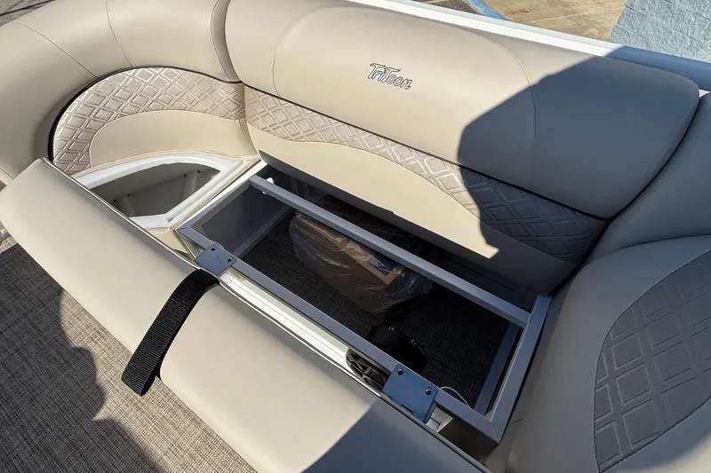 Slide: The Image of 2026 JC Neptoon 25TT Sport boat seat with storage compartment open. - 32