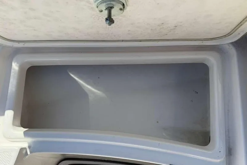 Slide: The Image of Storage compartment of 2023 Yamaha Boats 255 FSH Sport E. - 11