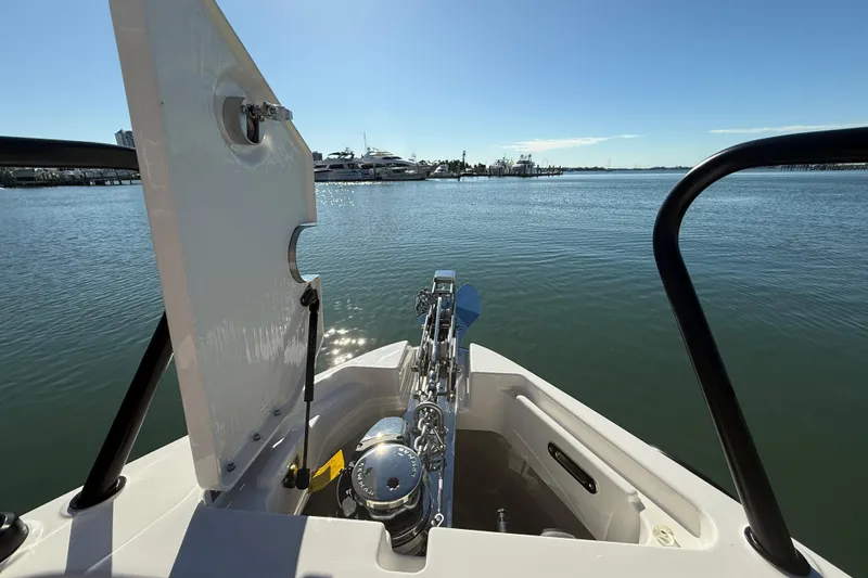 Slide: The Image of Bow view of 2026 Navan C30 boat with open hatch and calm waters. - 28