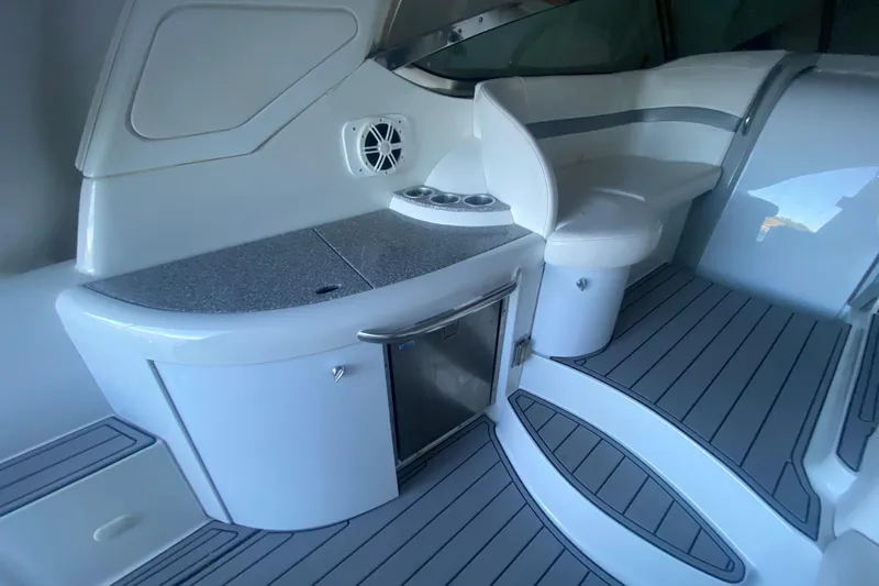 Slide: The Image of Storage compartment of a 2005 Formula 40 Performance Cruiser with red equipment inside. - 11