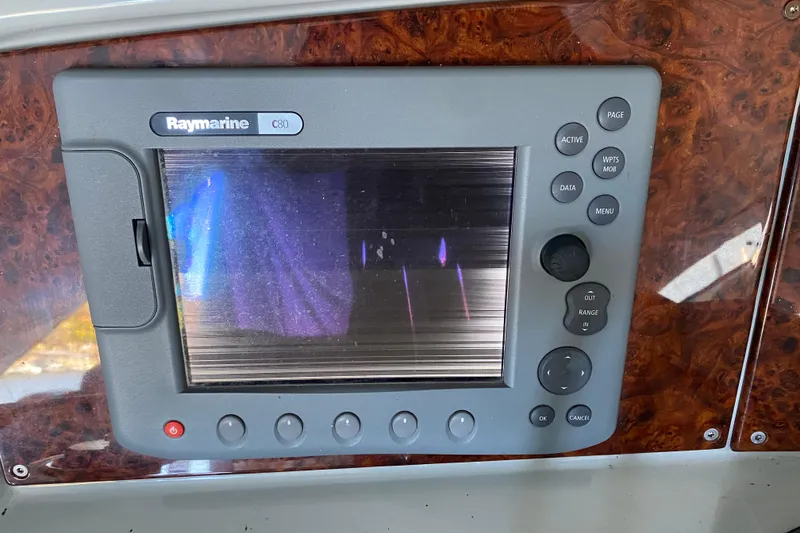 Slide: The Image of Spacious seating area on a 2005 Formula 40 Performance Cruiser boat deck. - 16