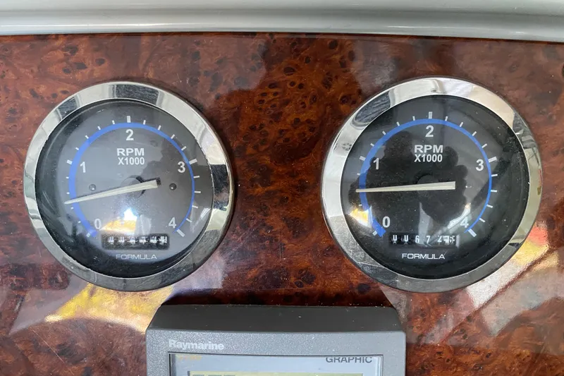 Slide: The Image of 2005 Formula 40 Performance Cruiser interior with white seating and sleek design. - 18