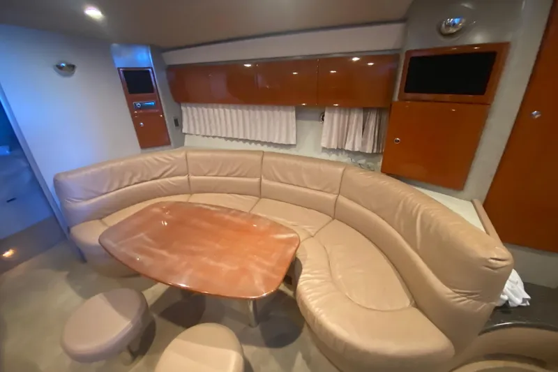 Slide: The Image of 2005 Formula 40 Performance Cruiser kitchen with wood cabinets and granite countertop. - 32