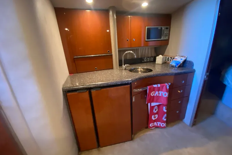 Slide: The Image of Luxurious bedroom interior of a 2005 Formula 40 Performance Cruiser yacht. - 33