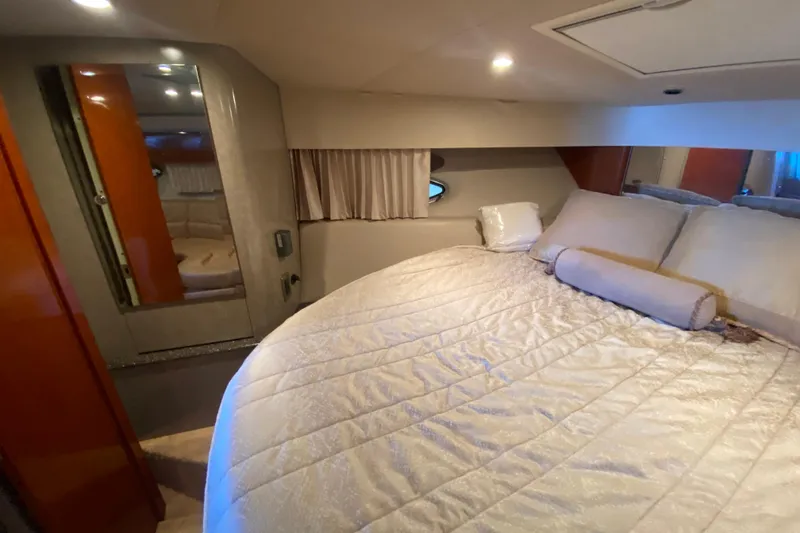 Slide: The Image of Luxurious interior of 2005 Formula 40 Performance Cruiser with cozy bed and elegant decor. - 35