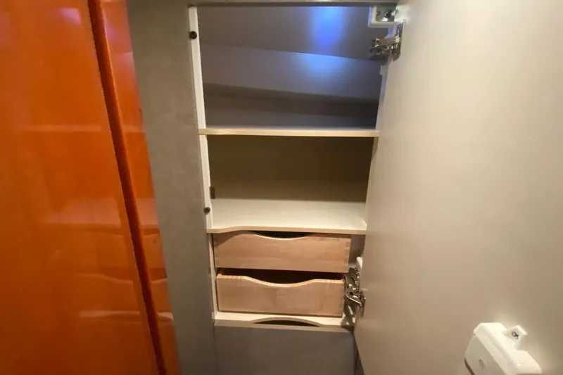 Slide: The Image of Engine compartment of a 2005 Formula 40 Performance Cruiser, showcasing dual engines and components. - 36