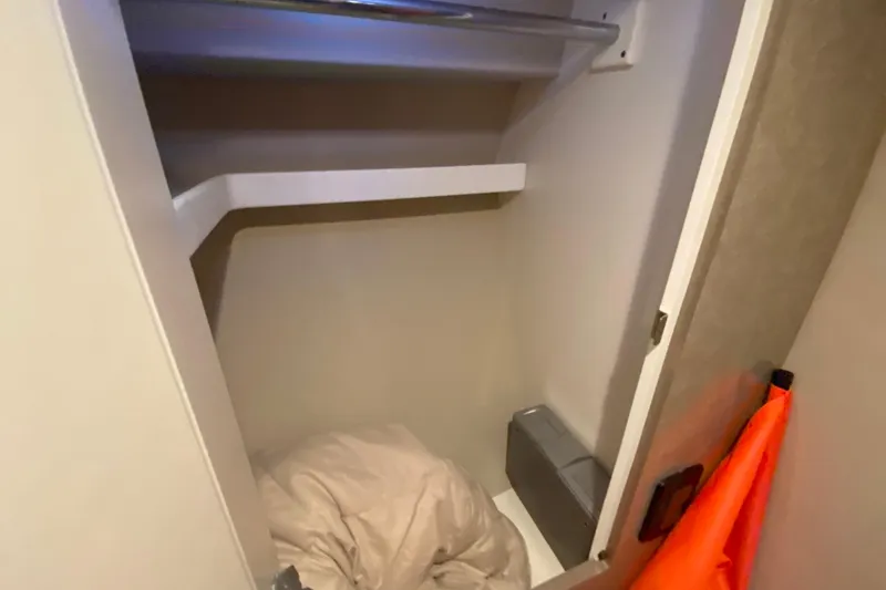 Slide: The Image of Engine room of a 2005 Formula 40 Performance Cruiser with visible components and piping. - 38