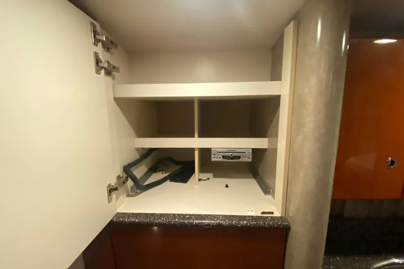 Slide: The Image of 2005 Formula 40 Performance Cruiser docked in a covered marina. - 42