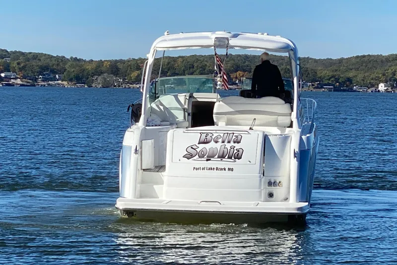 Slide: The Image of 2005 Formula 40 Performance Cruiser on a lake with autumn trees in the background. - 6