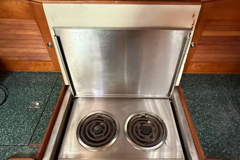 Slide: The Image of Stainless steel stove with two burners on a 1999 Sabre 36 Express yacht. - 22