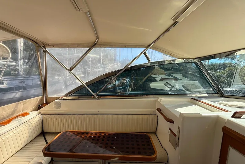 Slide: The Image of Interior of 1999 Sabre 36 Express yacht with seating and table. - 36