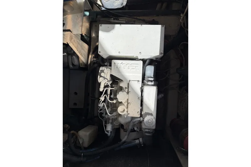 Slide: The Image of Engine compartment of a 1999 Sabre 36 Express boat. - 42