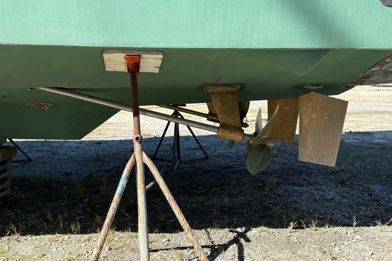 Slide: The Image of Bottom view of a 1999 Sabre 36 Express boat showing propeller and rudder. - 43