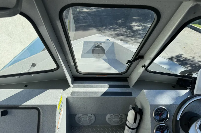 Slide: The Image of Interior view of a 2017 Duckworth 20 Advantage boat cockpit. - 12