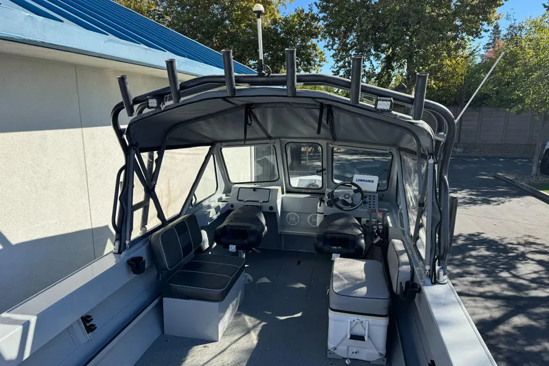 Slide: The Image of 2017 Duckworth 20 Advantage boat interior with seating and steering console. - 7