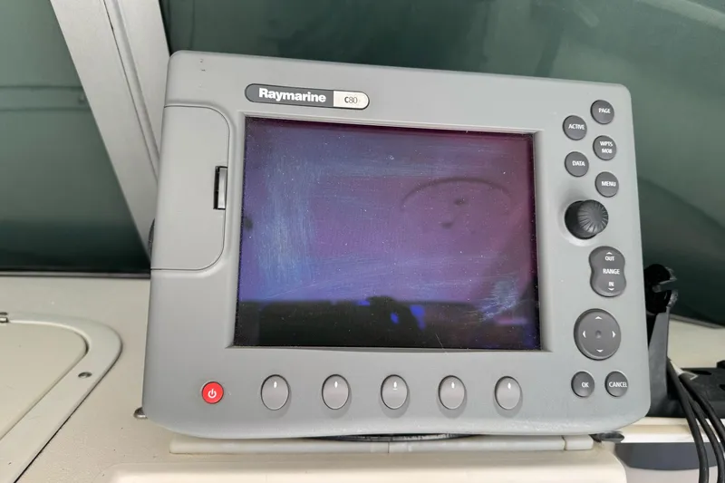 Slide: The Image of Raymarine C80 display on 2005 Striper SeaSwirl 2601 boat dashboard. - 16