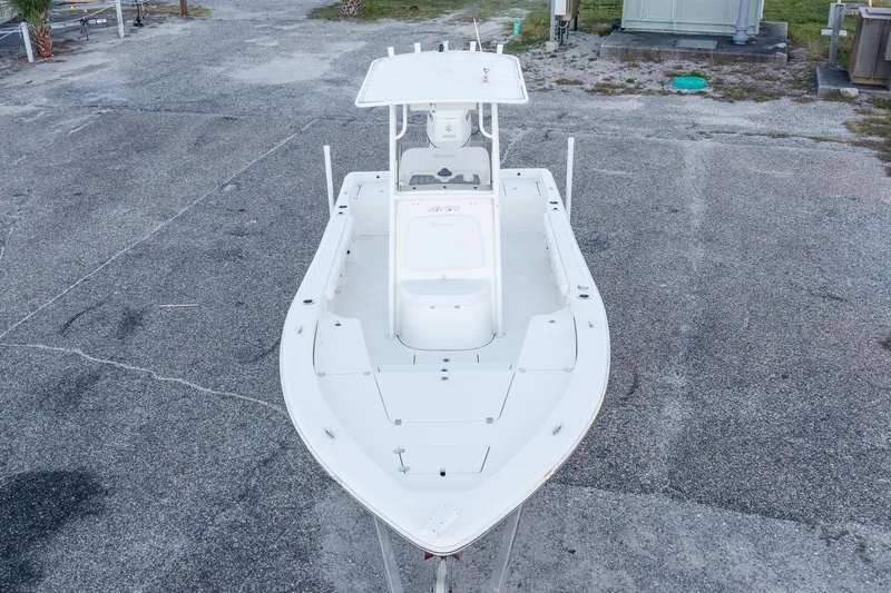 Slide: The Image of 2017 Avenger AV24 boat on a gravel surface, top view. - 30