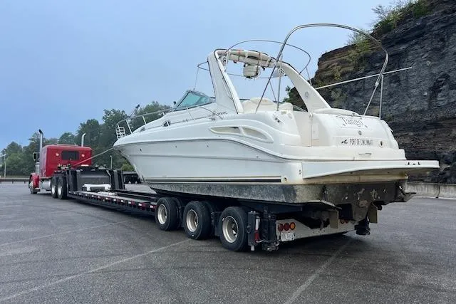 Slide: The Image of 2001 Sea Ray 340 Sundancer yacht on trailer, ready for transport. - 11
