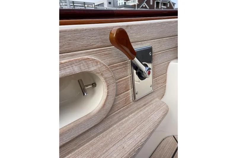 Slide: The Image of Wooden interior detail of 2001 Wajer Captain's Launch 7m boat with control lever. - 17